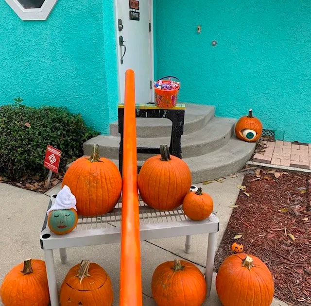 Orange pumpkins and jack-o'-lantern decorate the front walk and door of the Fresh Life Recovery provides addicts structure, accountability, support, affordable living, and resources to recreate a substance-free life.